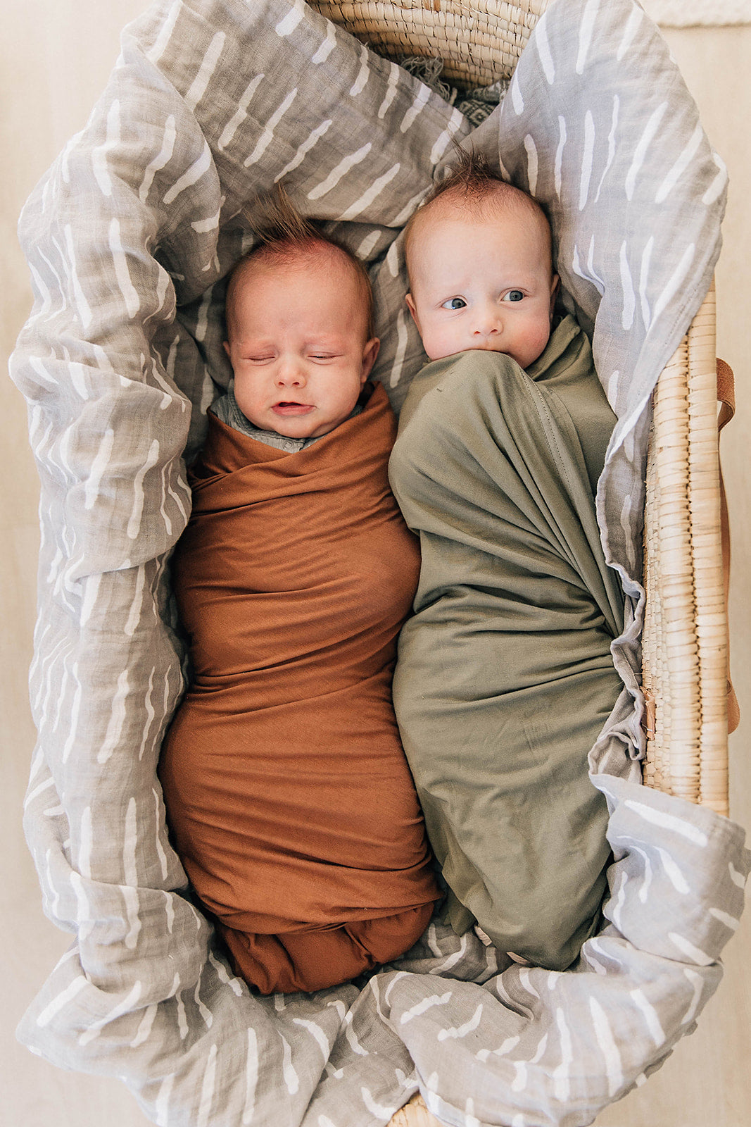 Mebie Baby Olive Stretch Swaddle. Mebie Baby Bamboo Stretch Swaddle. Gender Neutral for take home outfits and swaddling newborns.