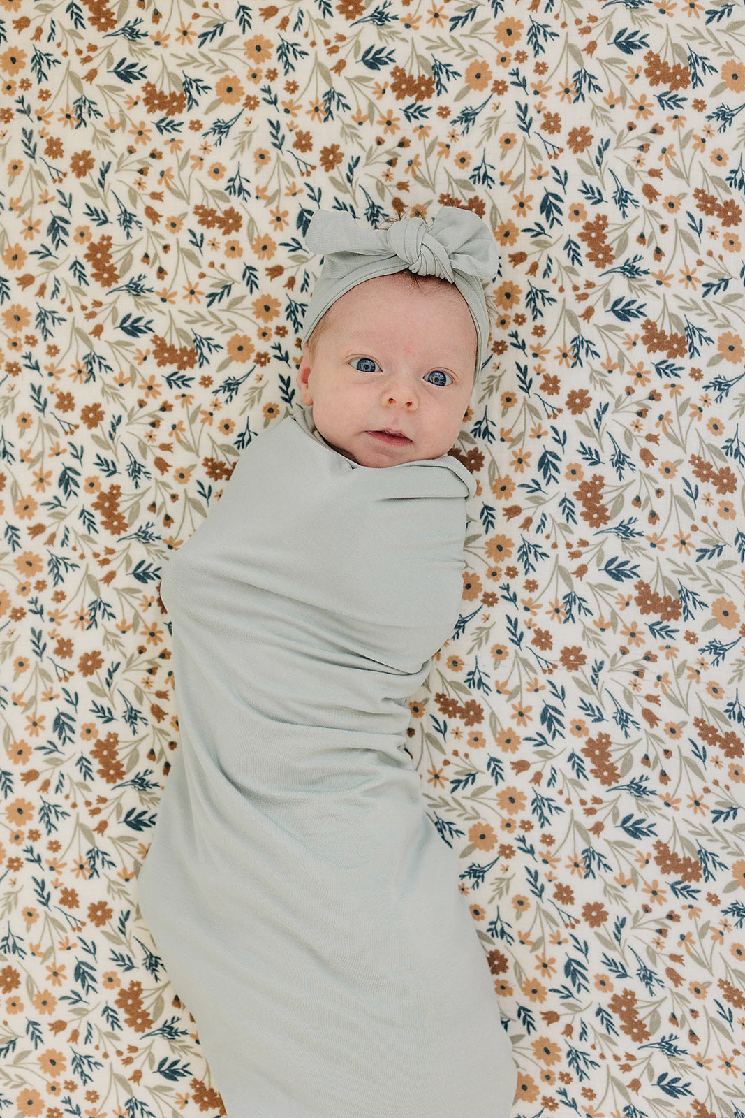 Mebie Baby Bamboo Stretch Swaddle. Gender Neutral for take home outfits and swaddling newborns.