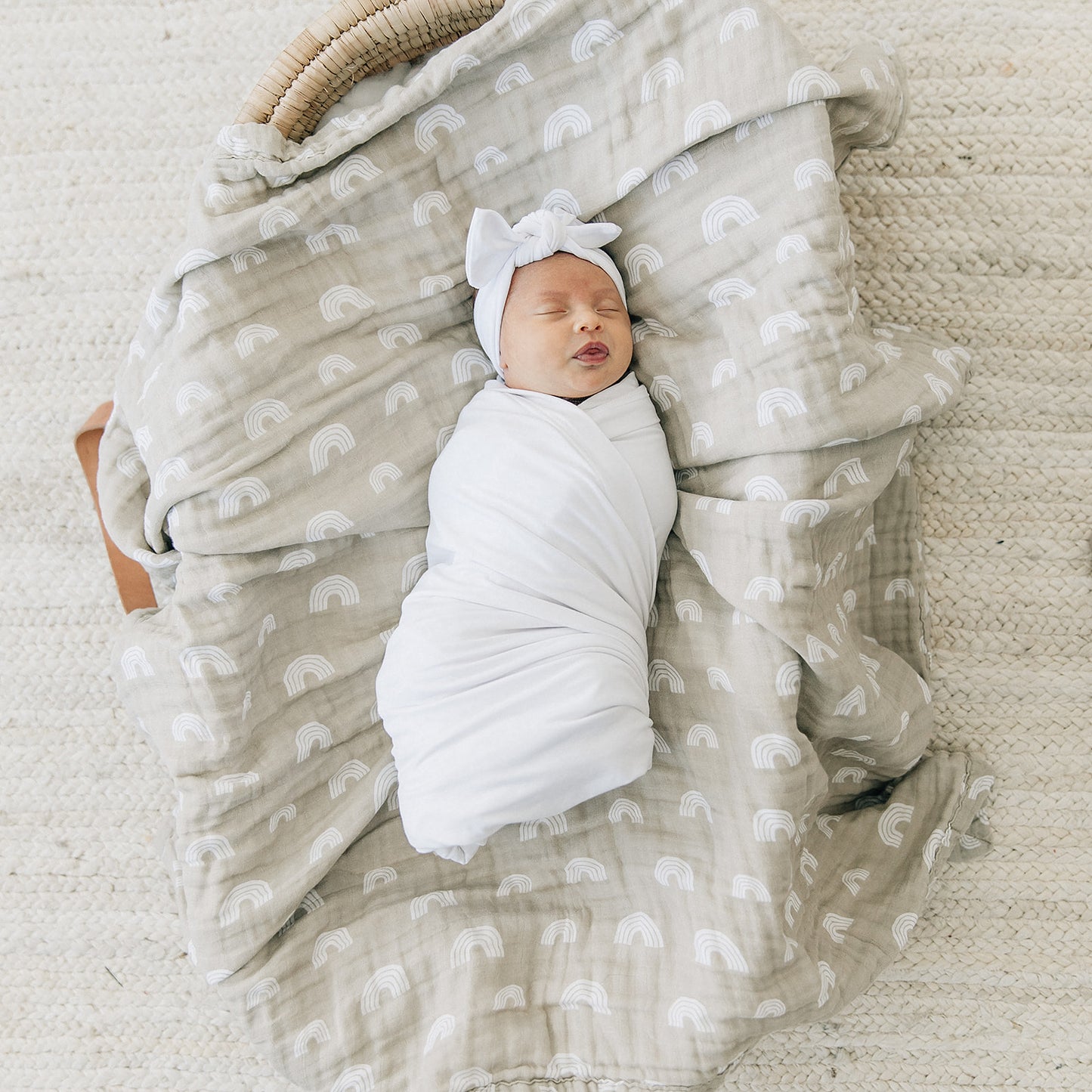 Mebie Baby White Stretch Swaddle. Mebie Baby Bamboo Stretch Swaddle. Gender Neutral for take home outfits and swaddling newborns.