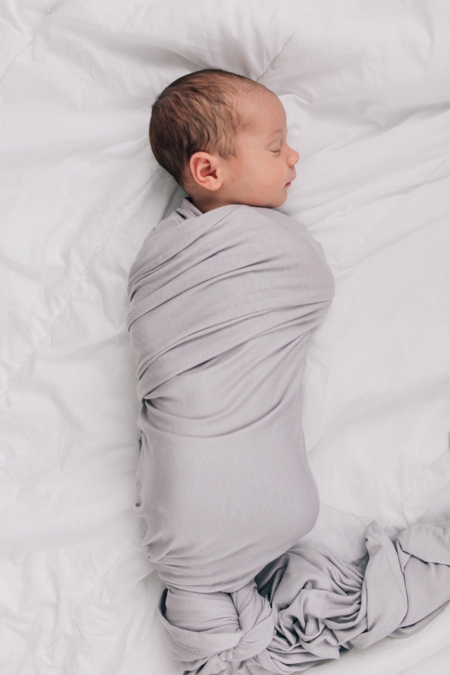 Mebie Baby Stone Stretch Swaddle. Mebie Baby Bamboo Stretch Swaddle. Gender Neutral for take home outfits and swaddling newborns.