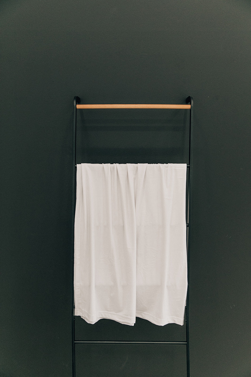 Mebie Baby White Stretch Swaddle. Mebie Baby Bamboo Stretch Swaddle. Gender Neutral for take home outfits and swaddling newborns.