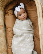 Mebie Baby Gender Neutral Infant Muslin Swaddle its 100% cotton.
