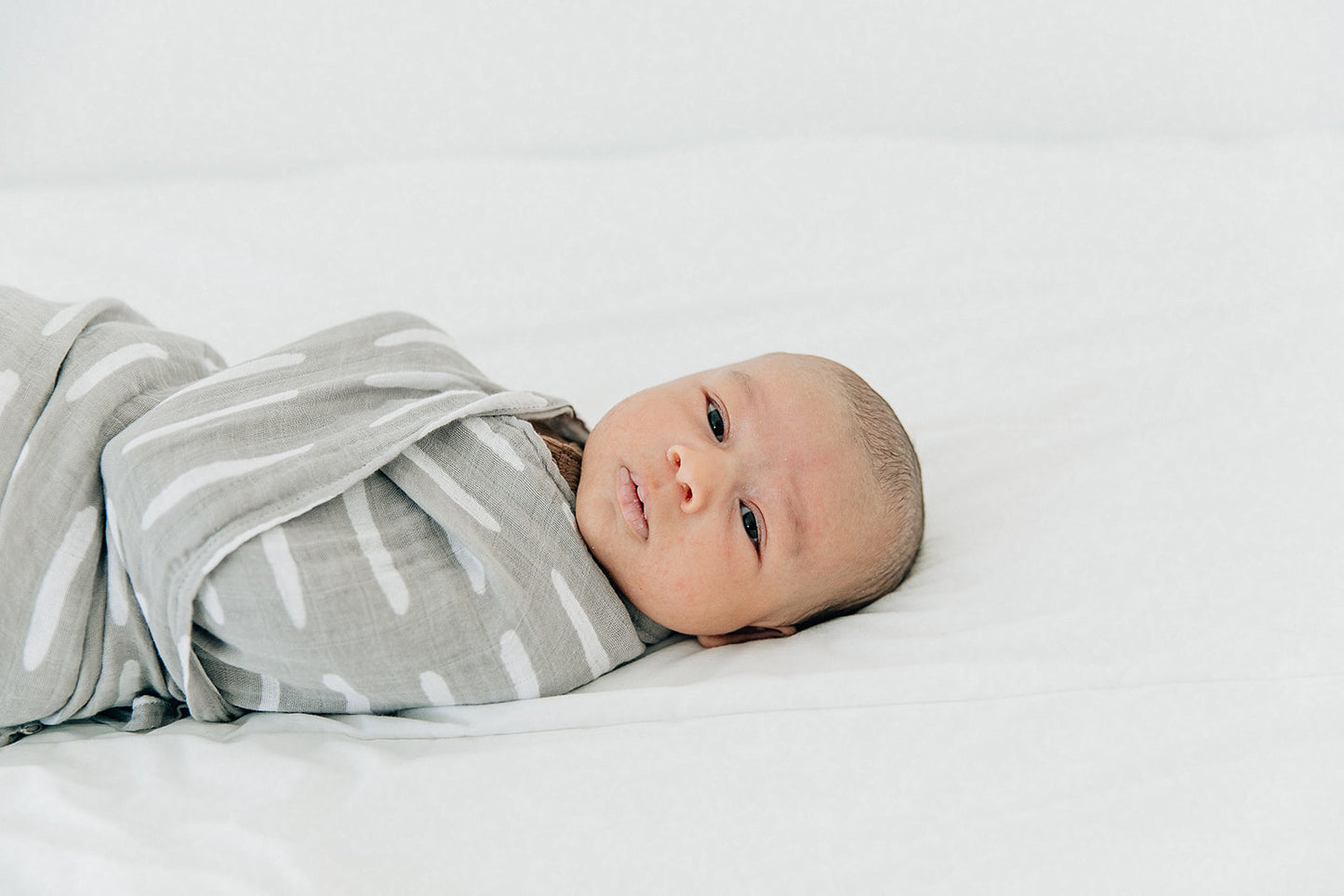 Mebie Baby Gender Neutral Infant Muslin Swaddle its 100% cotton.