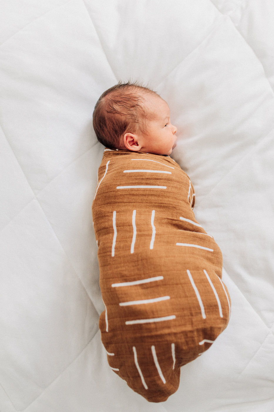 Mebie Baby Mustard Mudcloth Muslin Swaddle. Mebie Baby Gender Neutral Infant Muslin Swaddle its 100% cotton.